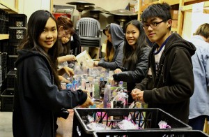 Members help to package gifts for local teenagers